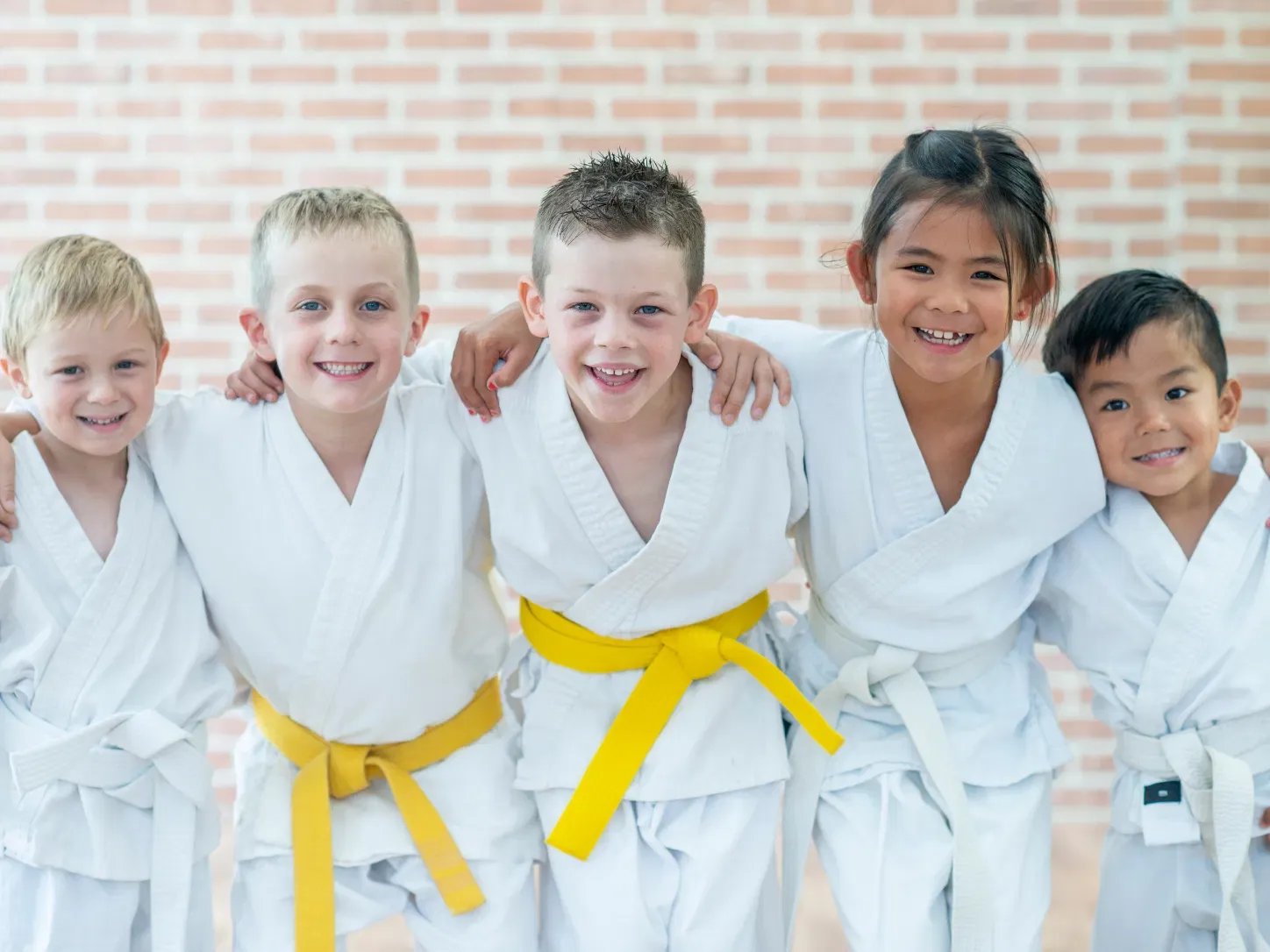 Webster's young students smiling together in their doboks